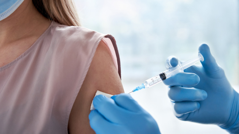 woman receiving vaccine