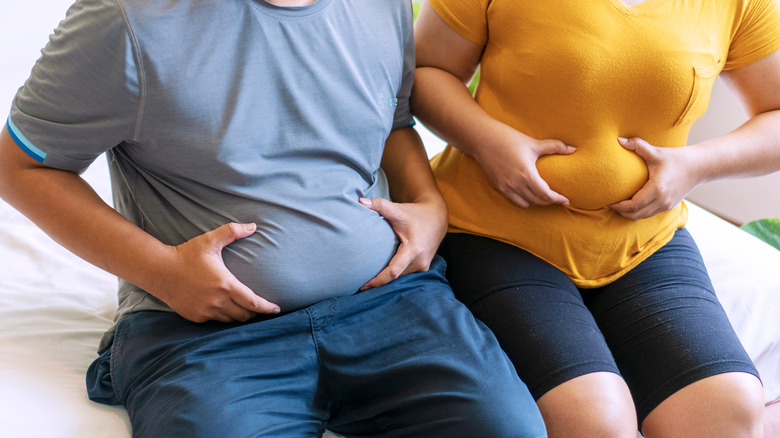 Man and woman with big bellies