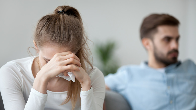 woman crying man ignoring