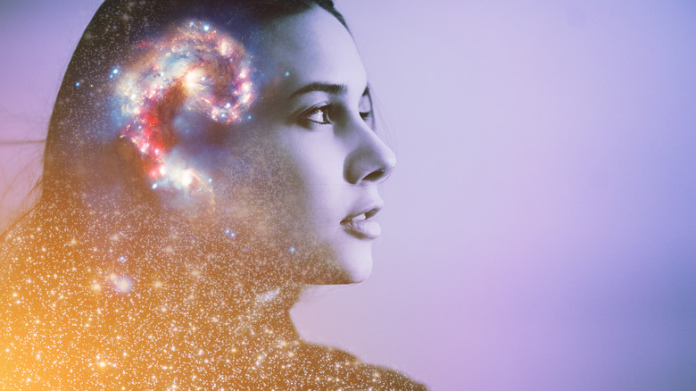 depiction of woman with stars in her mind, mind body connection
