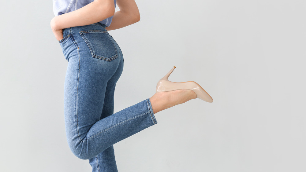woman in skinny jeans, heels
