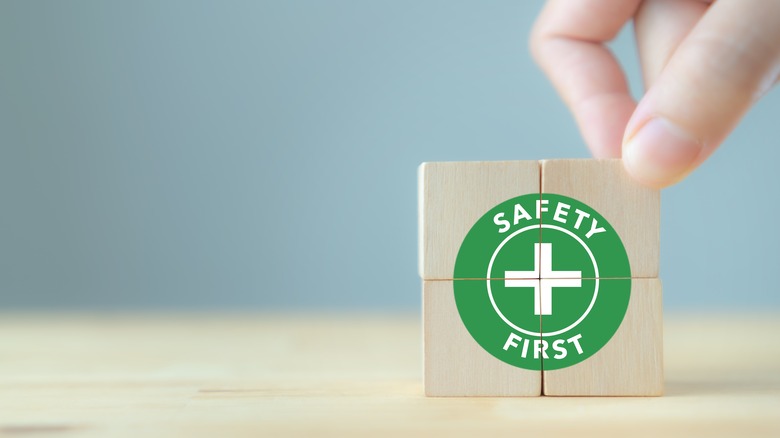 safety first symbol on wooden blocks