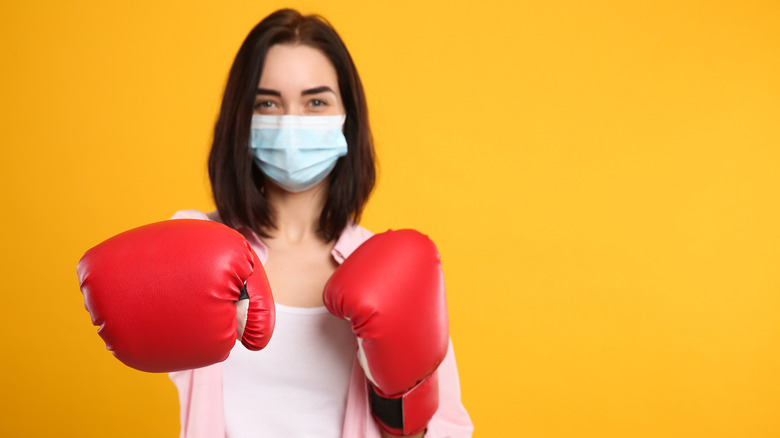 woman with punching gloves