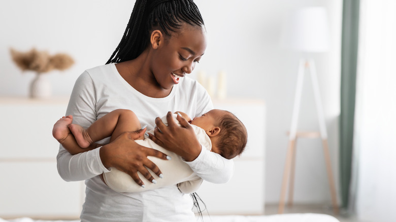 woman holding baby