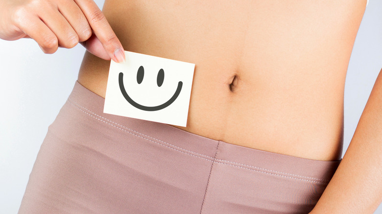 smiley face drawing near stomach