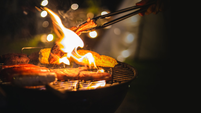 Grilling meat for a late night BBQ