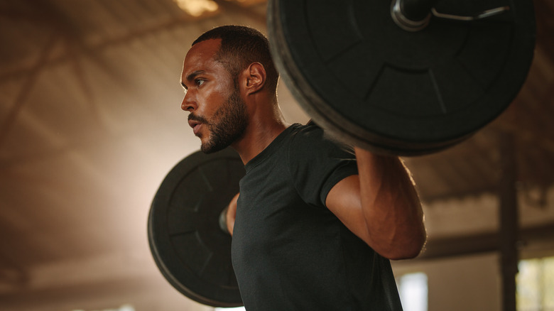 Bodybuilder doing weight lifting workout