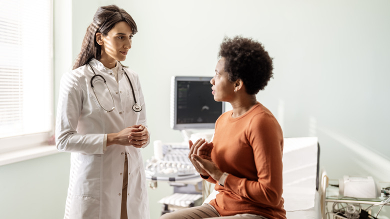 Woman having a conversation with her doctor