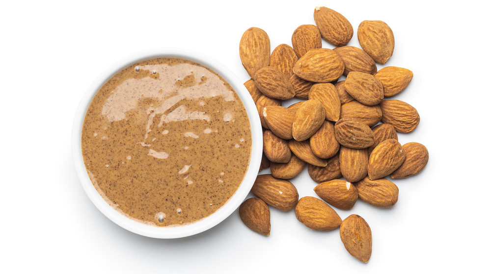 Bowl of almonds with almond butter