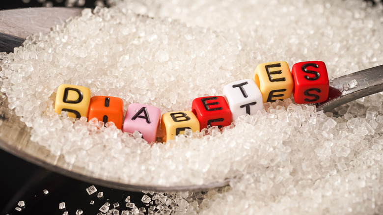 Diabetes wordings on top of sugar heaps