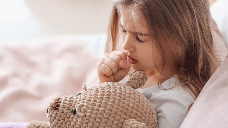 young girl sick with cold