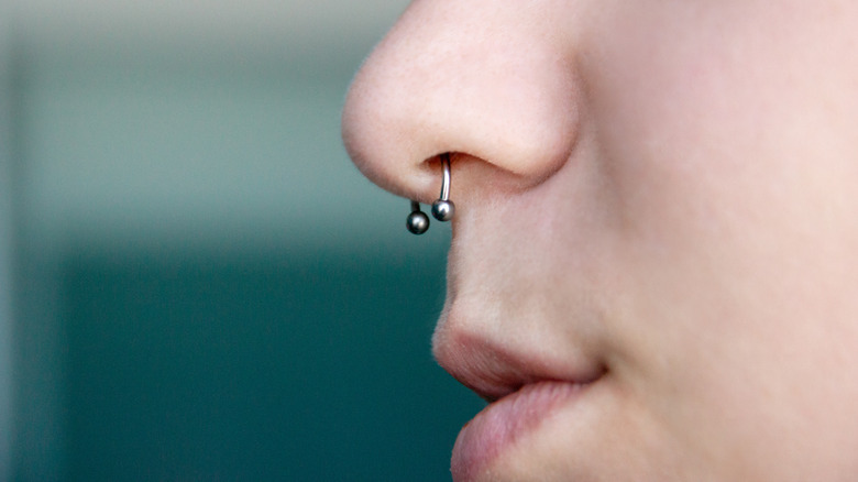 close up of septum ring in nose