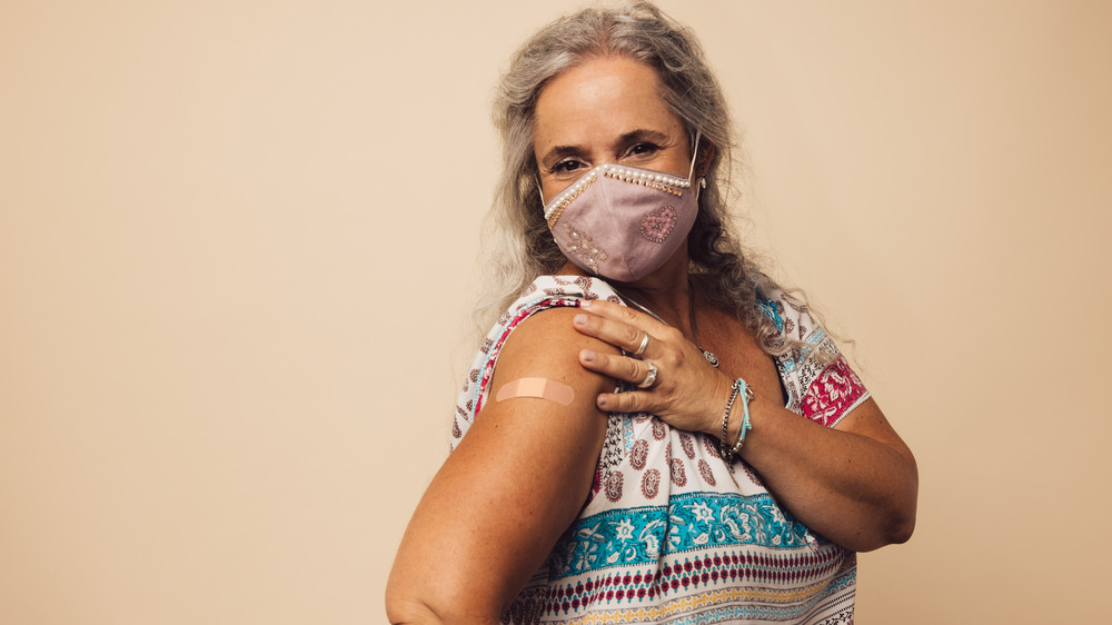 Older woman who has just been vaccinated