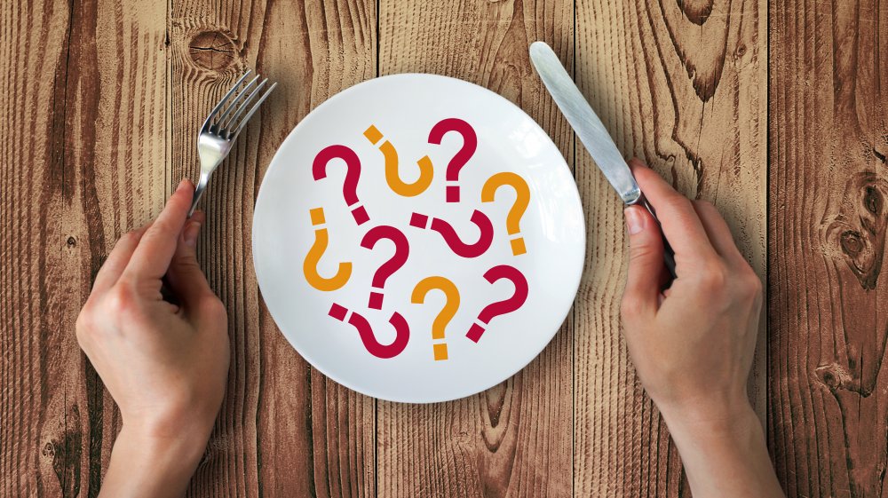 Questions marks on a plate