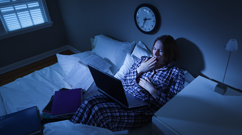 Woman staying up late