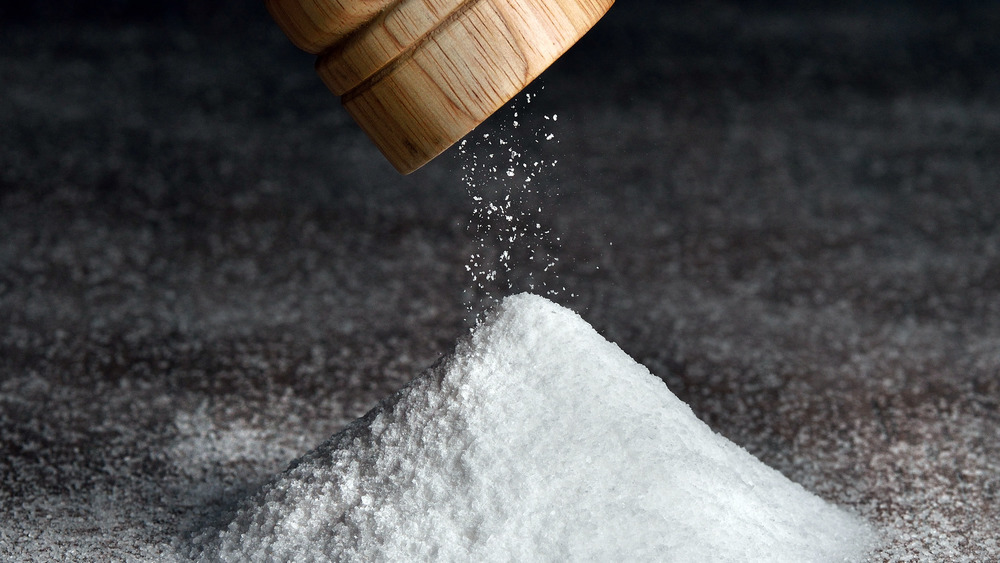 salt being ground on a table