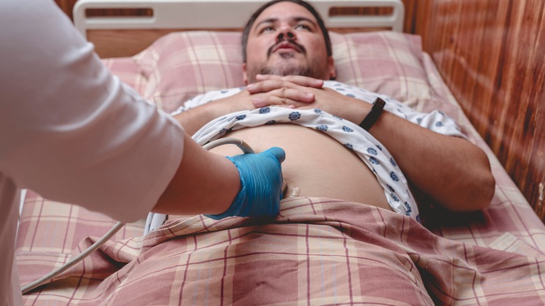 Man having a bladder ultrasound