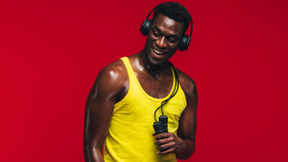 man holding jump rope