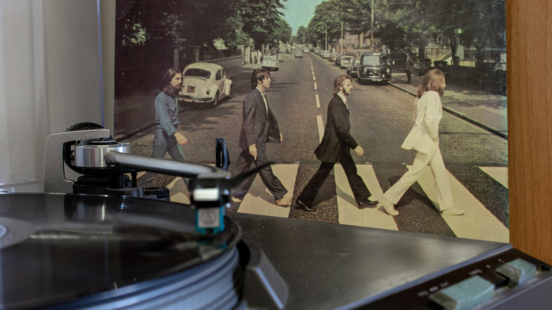 Turntable with Beatles cover in background