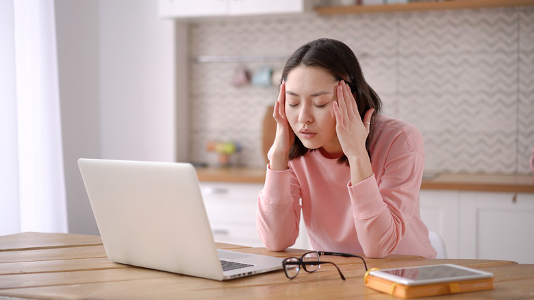 working woman suffering from fatigue