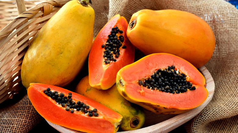 papayas arranged inside a bowl