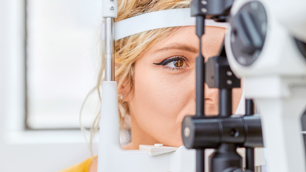 woman getting eye test