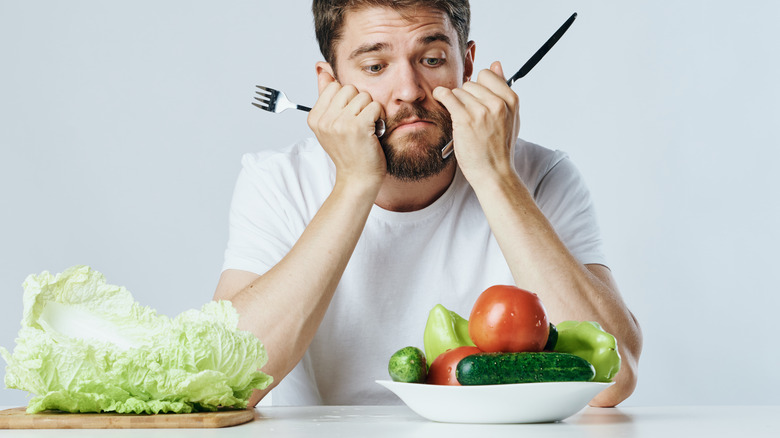 A man bored with his healthy food