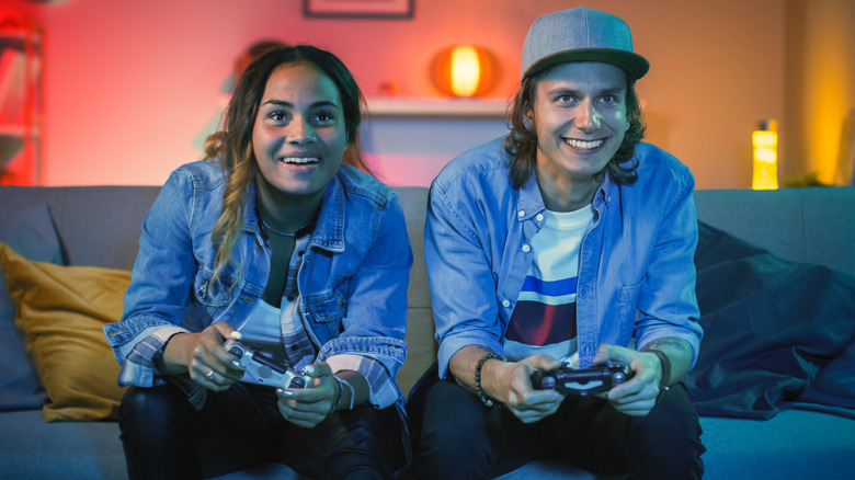 young adults playing video games