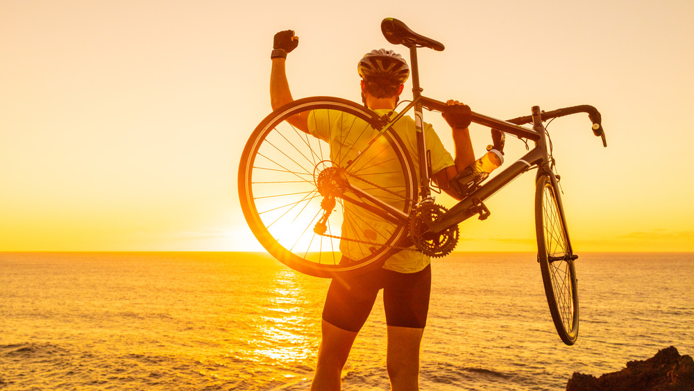 Man With Bike Celebrating