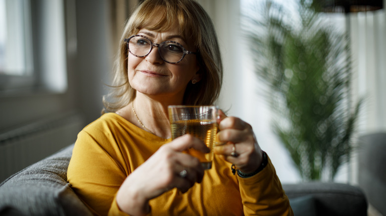 woman enjoying herbal tea