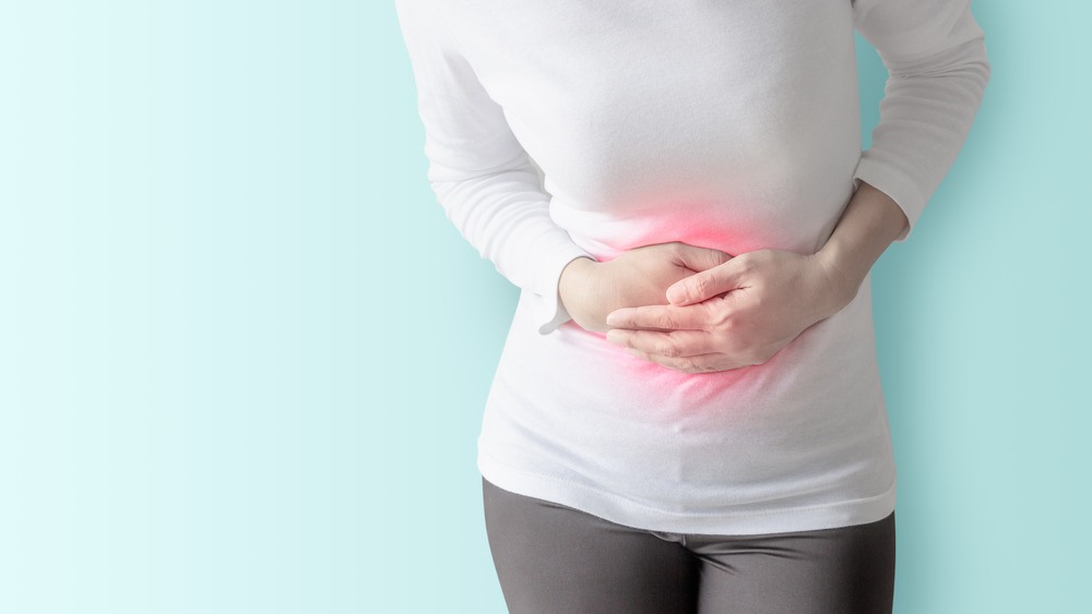 Woman with stomach pain