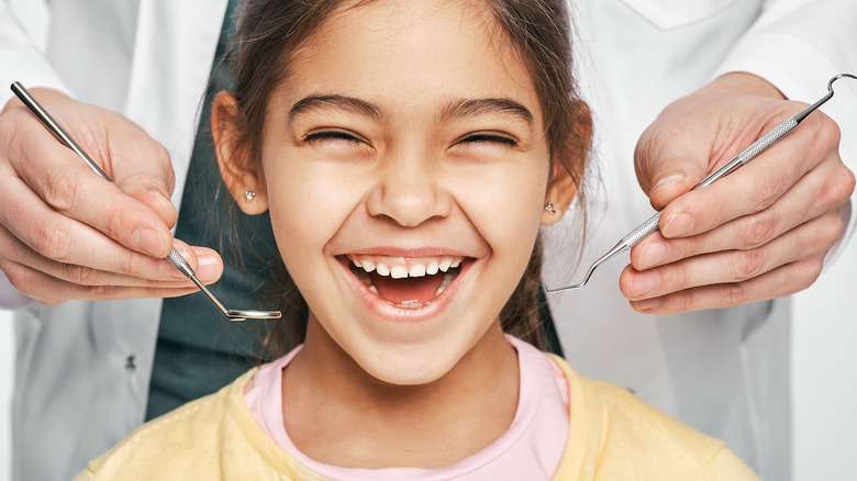 Smiling girl at dentist appointment