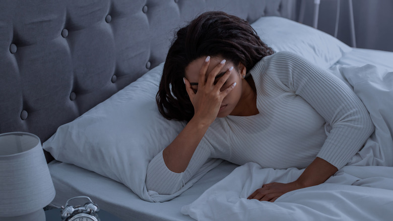 Woman experiencing lack of sleep
