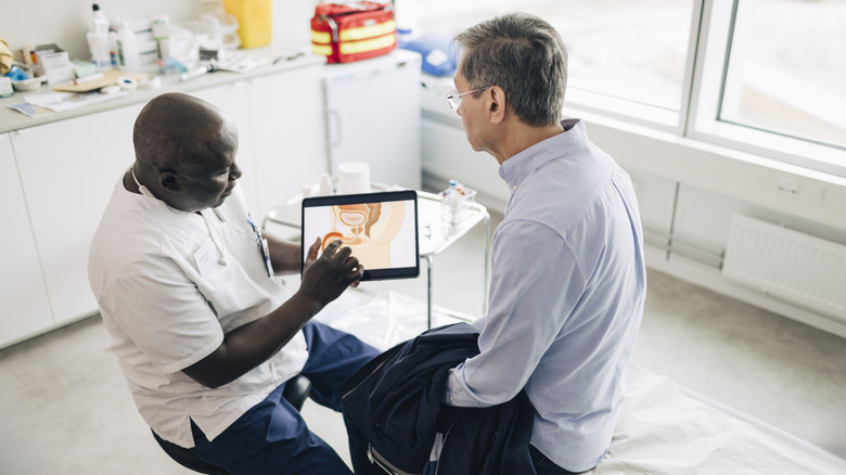 Doctor talking to patient about prostate health