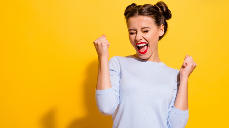 Woman looking very happy