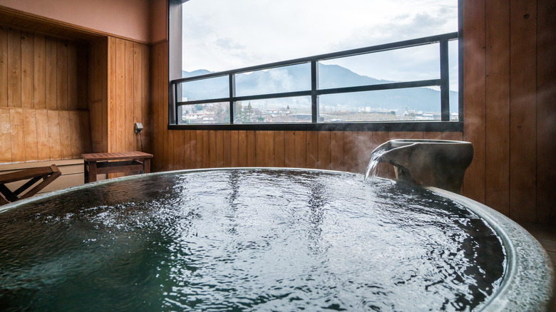 A hot bath with an outdoor view