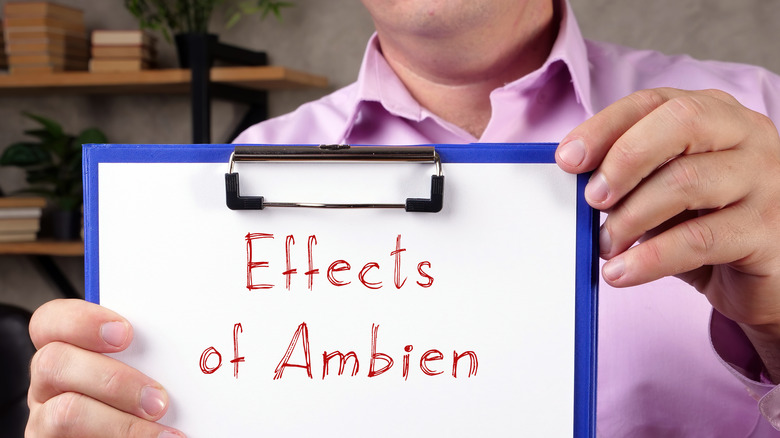 blue clipboard with paper reading "Effects of Ambien"