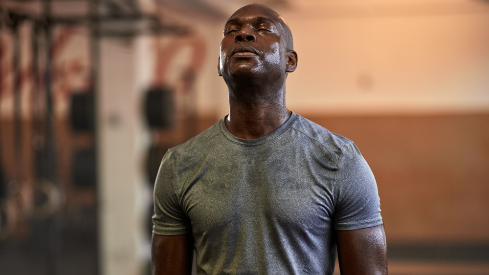 man sweating after workout