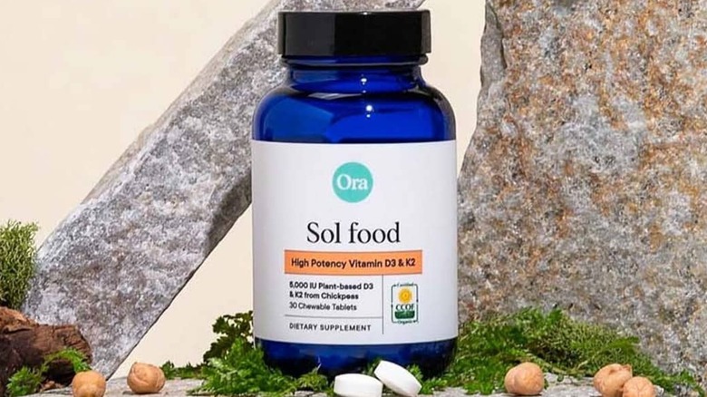 Bottle of Ora Organic vitamin supplements