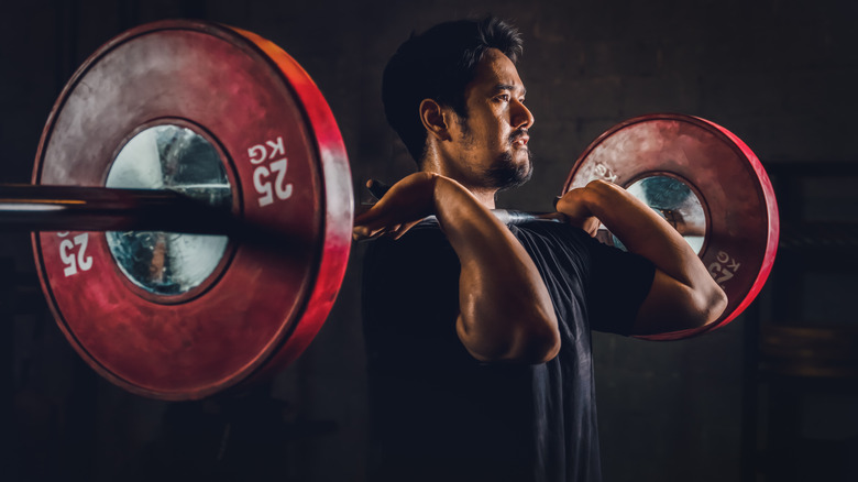 man doing a front squat 