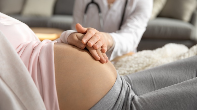 doctor with pregnant patient