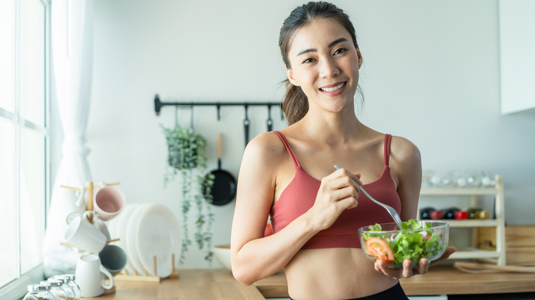 Woman eating a salad