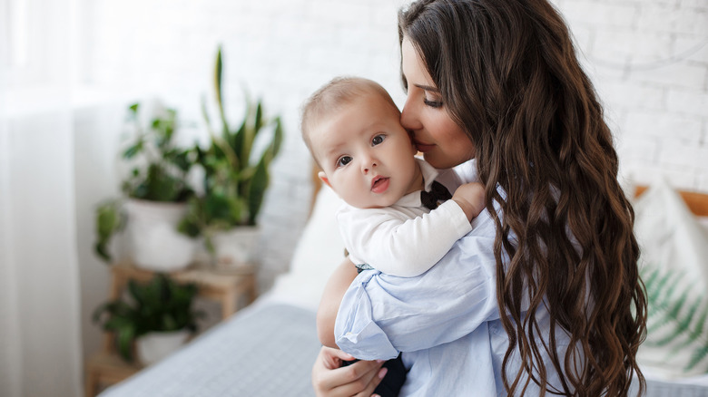 mother holding her baby