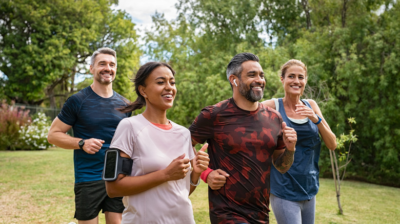 a group of people running a race