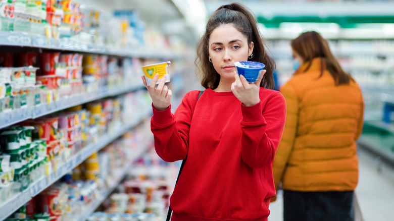 woman shopping for yogurt