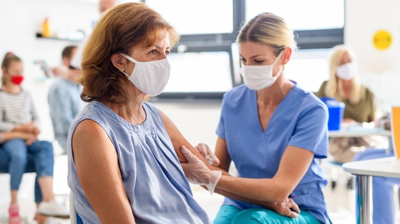 woman getting vaccinated