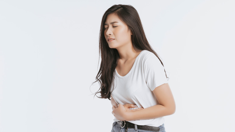 Woman uncomfortable from bloating