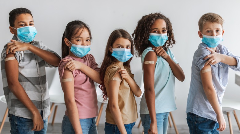 group of children getting vaccine