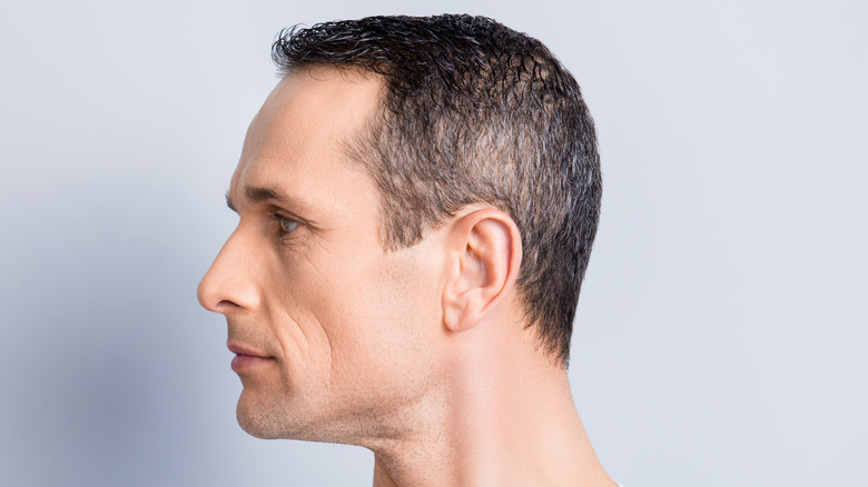 Profile of man with cheekbones 