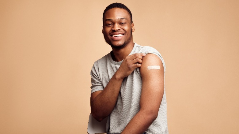 man vaccinated with a booster shot